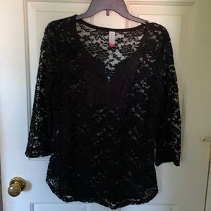 Very pretty black shear shirt.